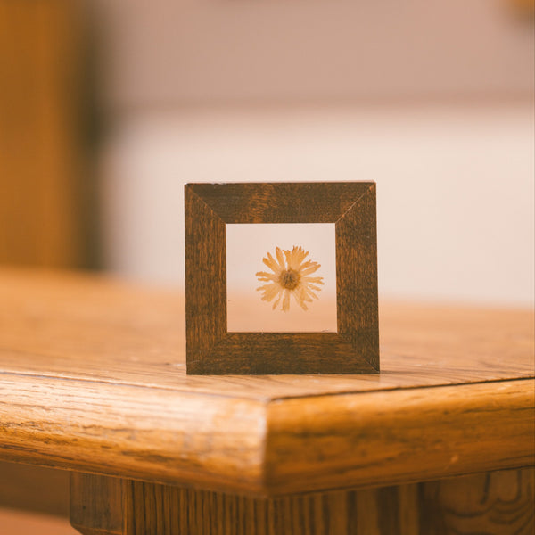 Pressed Floral custom mini frame on a wood table