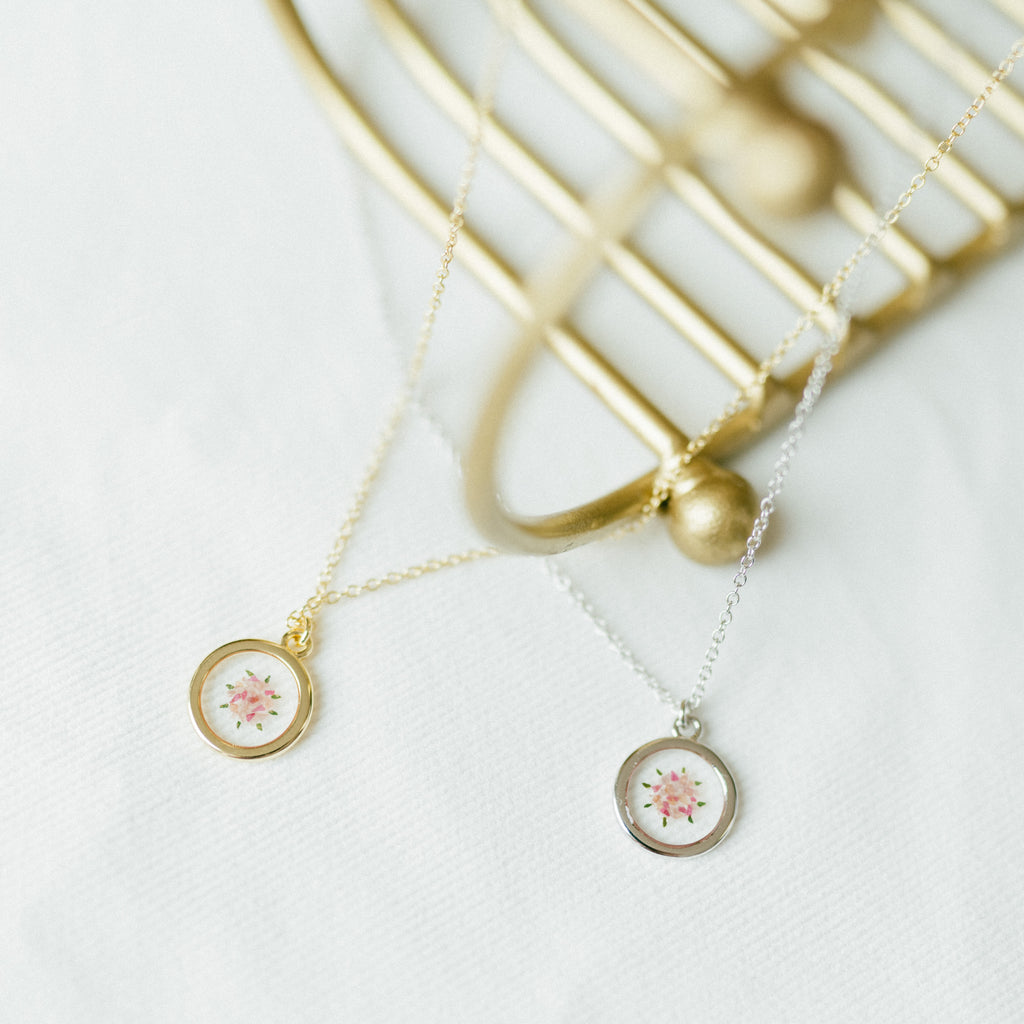 Gold and Silver custom Pressed floral necklaces made with petals from sentimental event