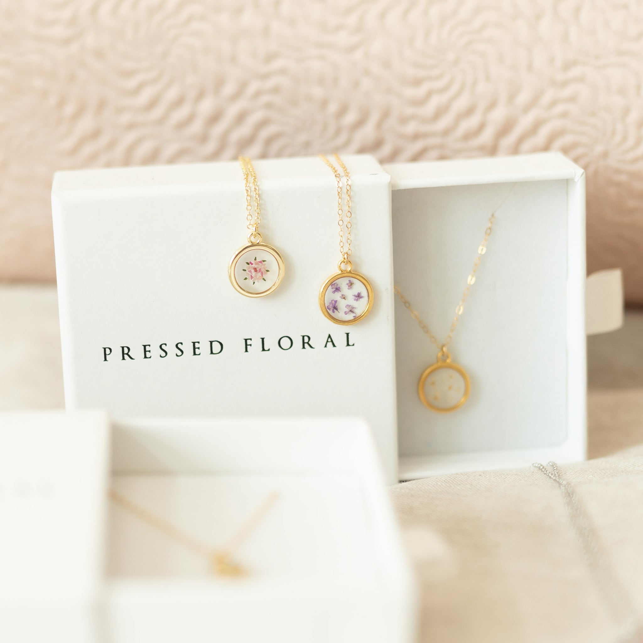 Sentimental pressed floral custom necklace paired with birth flower necklace 